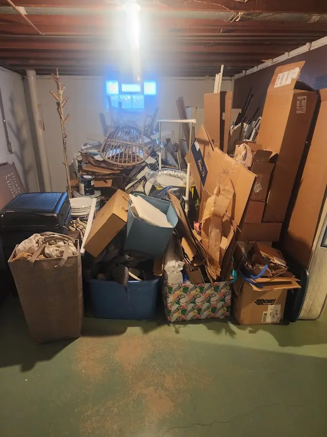 Roll-off dumpster container at job site for 15 Yard Dumpster Rental in Swanzey